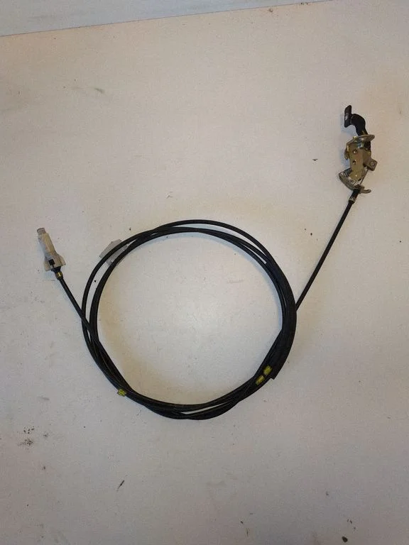 Fuel cap flap release cable