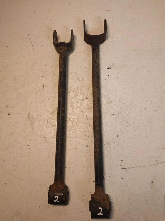 Rear suspension control arm