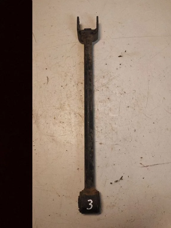 Rear suspension control arm