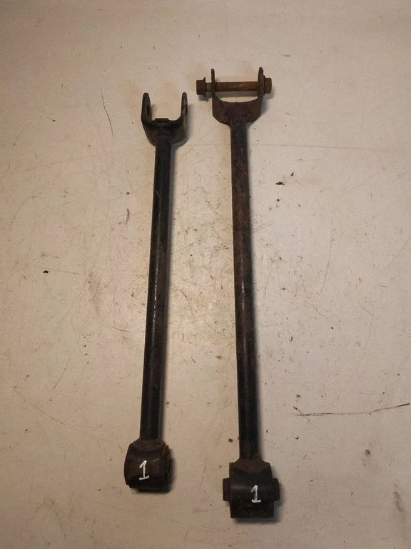 Rear suspension control arm