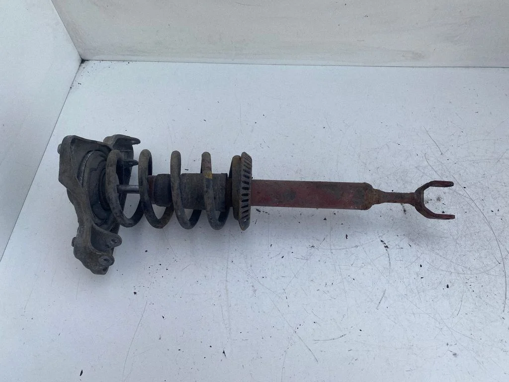 Front shock absorber with coil spring – Volkswagen Passat B5 (1997-2000)