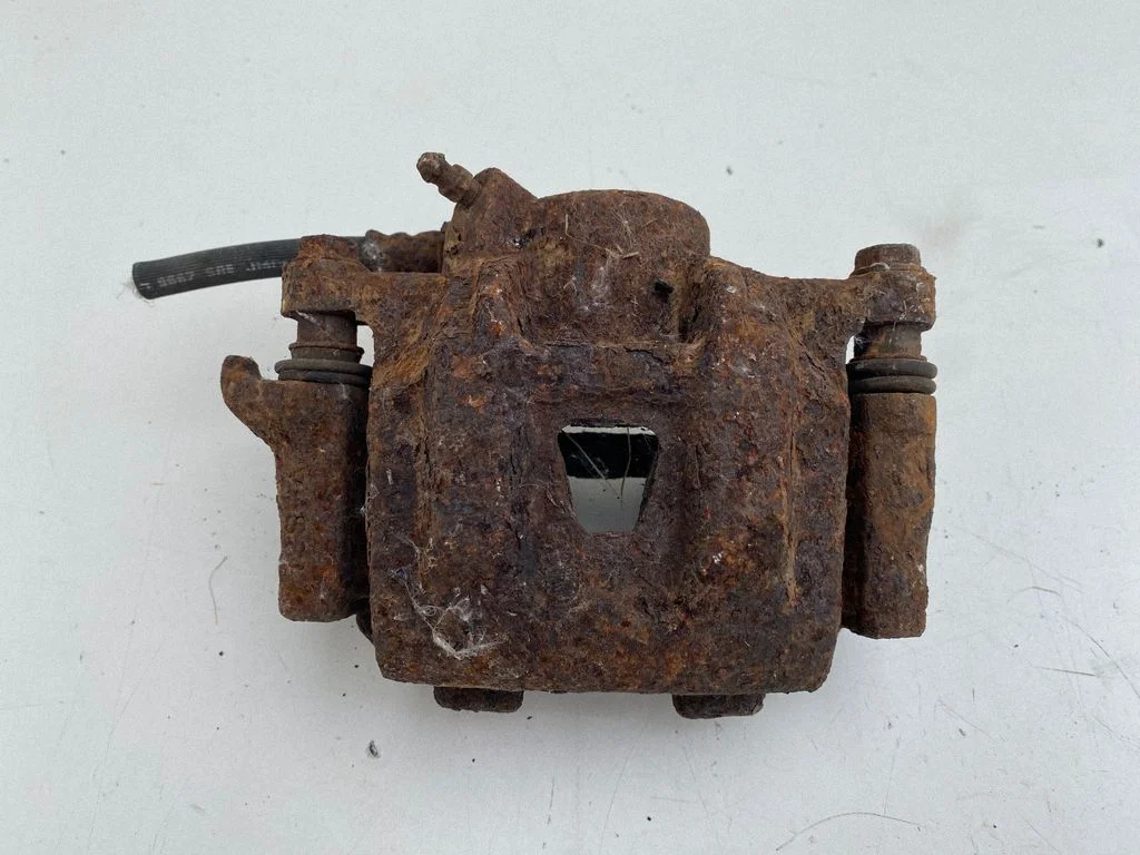 Front brake caliper – right