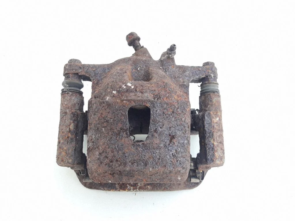 Front brake caliper – left