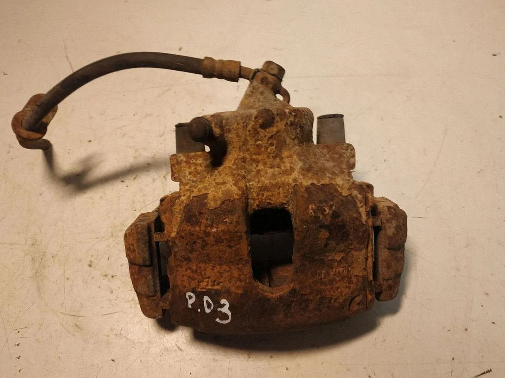 Front brake caliper – right