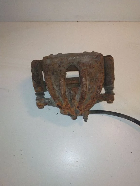 Front brake caliper – right