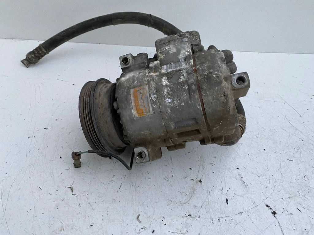Air conditioning (A/C) compressor (pump) – Volkswagen Passat B5 (1997-2000)