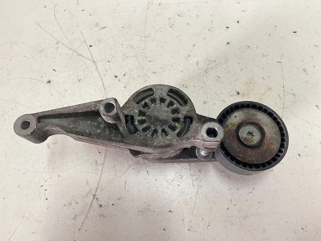 Generator/alternator belt tensioner – Volkswagen Touran I (2003-2010)