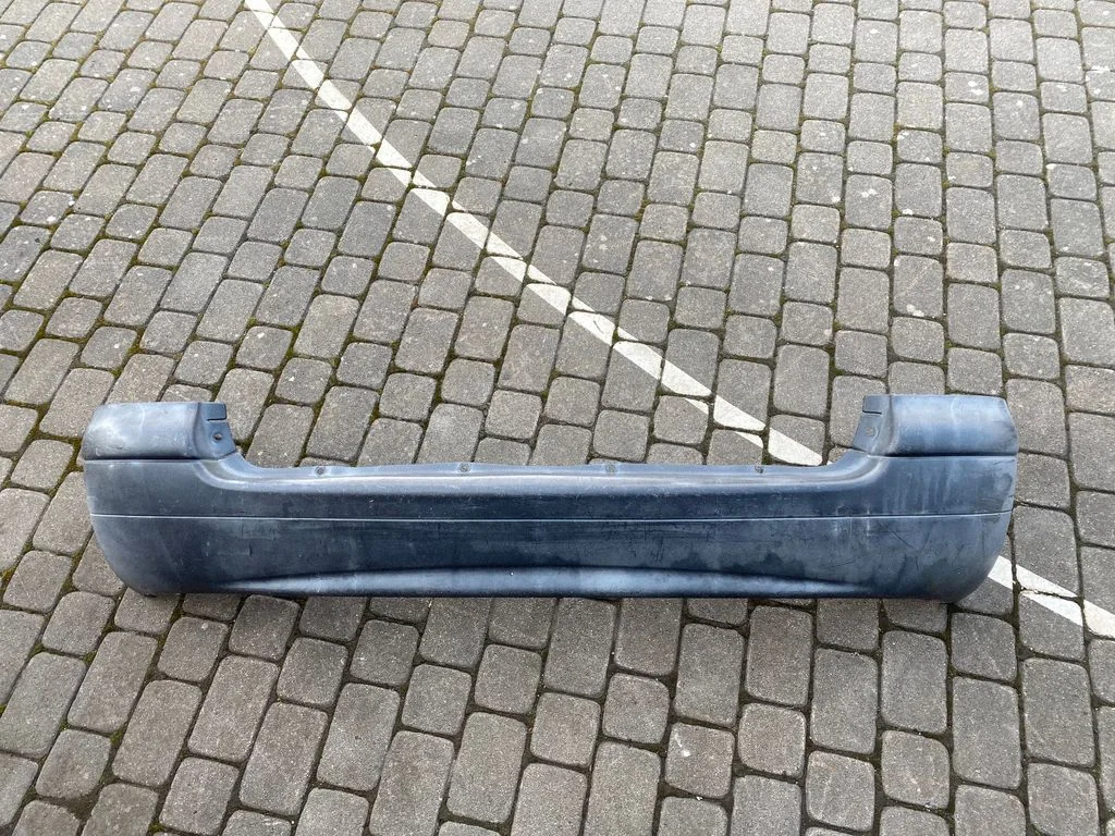 Rear bumper 7700838515