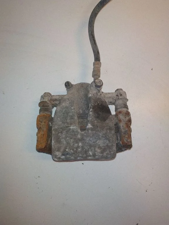 Rear brake caliper – right