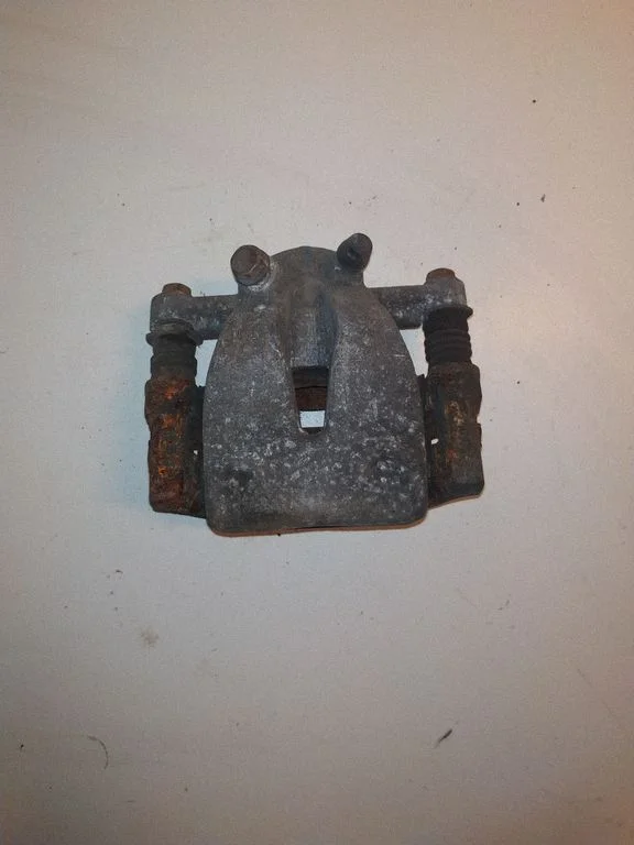 Rear brake caliper – left