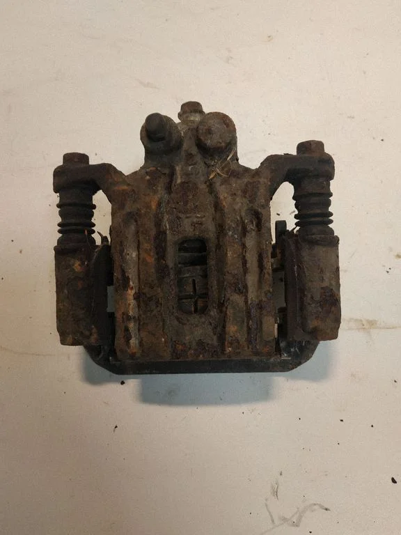 Rear brake caliper – right