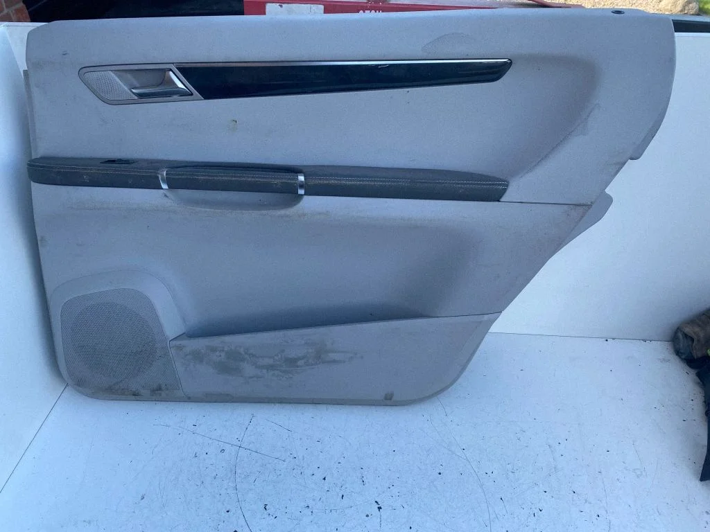 Rear door card panel trim – rear right