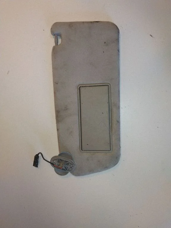 Sun visor – left