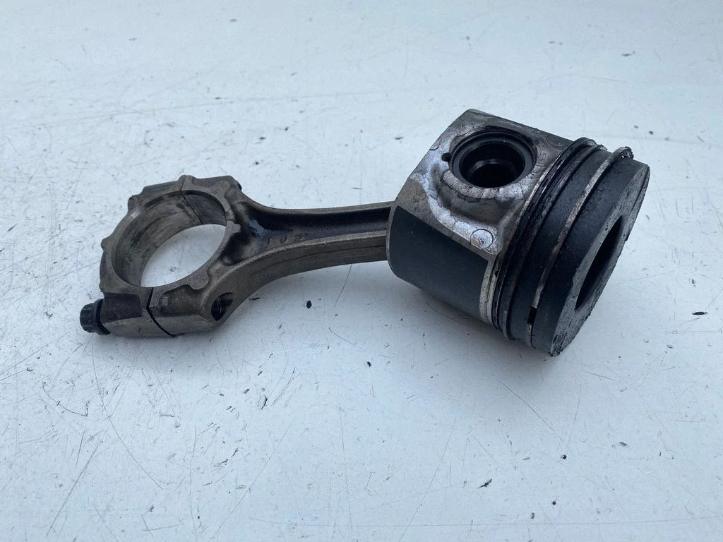 Piston with connecting rod