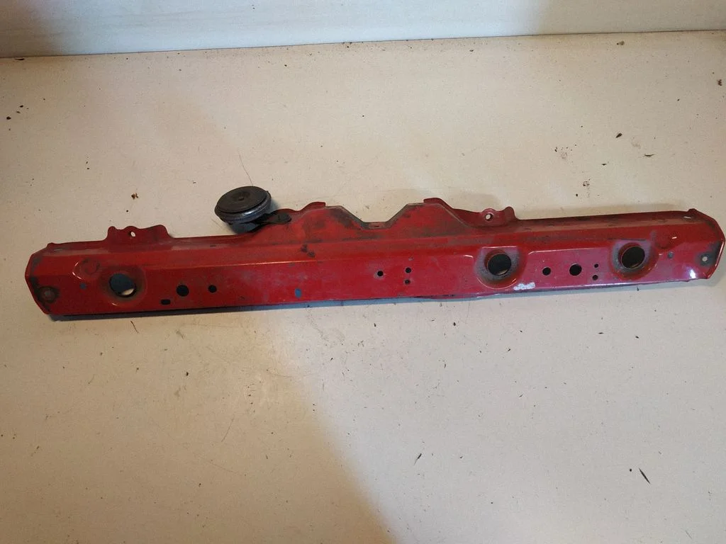 Top upper radiator support slam panel