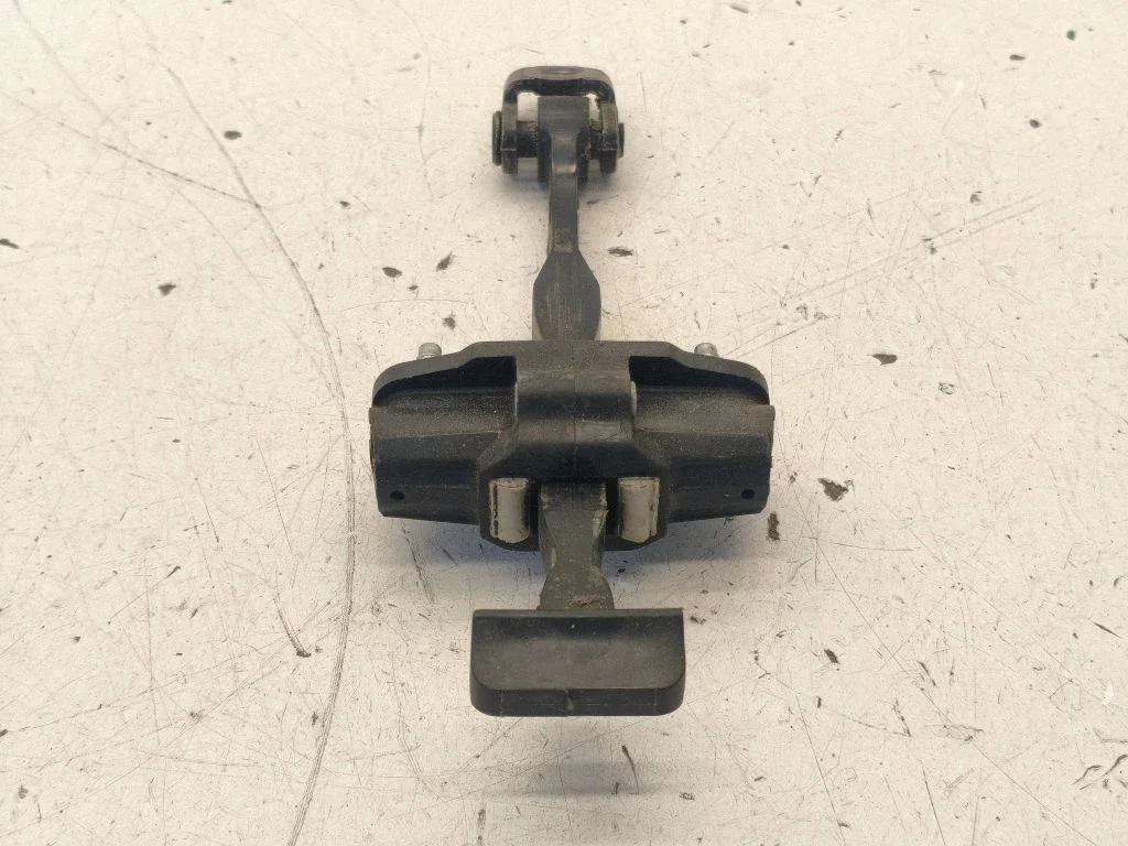 Front door check strap stopper BM51A23500AA