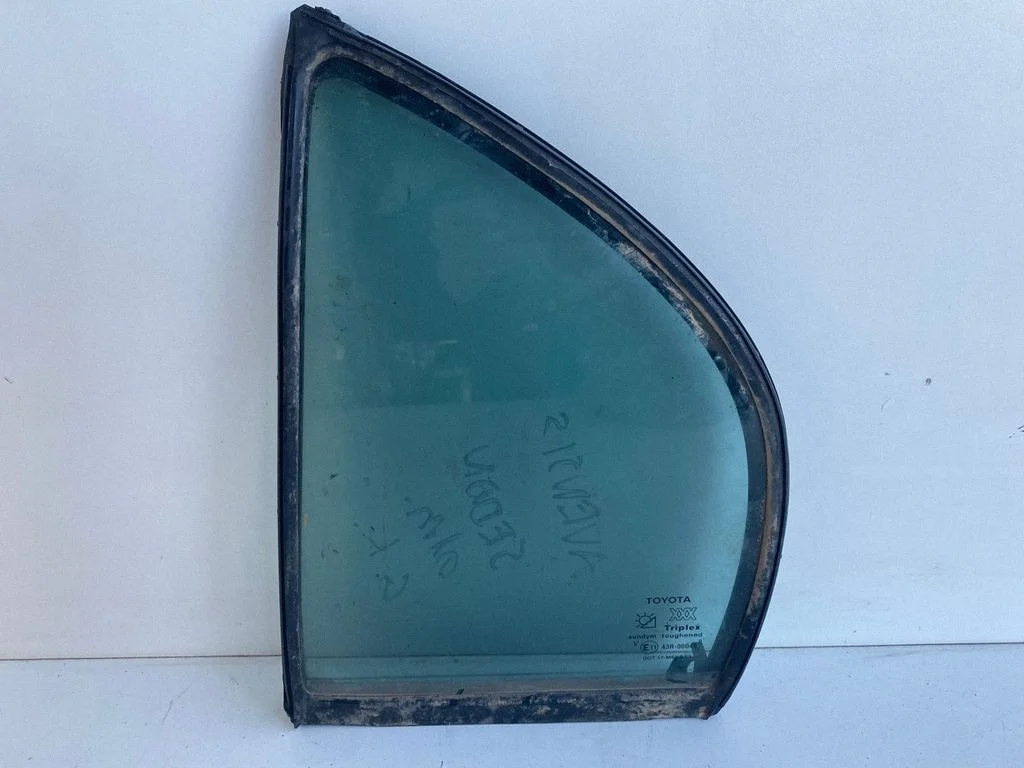 Rear vent window glass – left