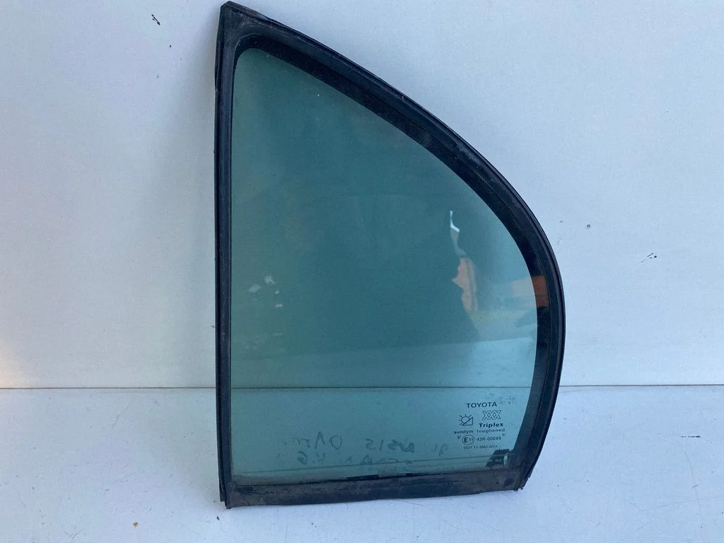 Rear vent window glass – left
