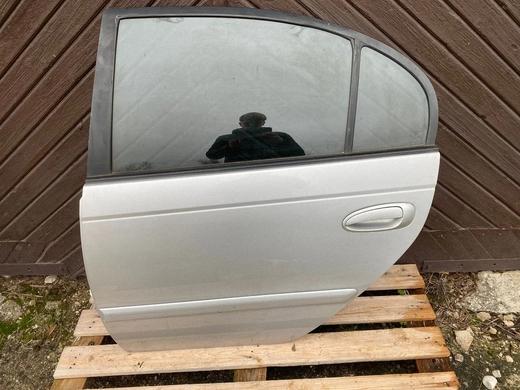 Rear door – left