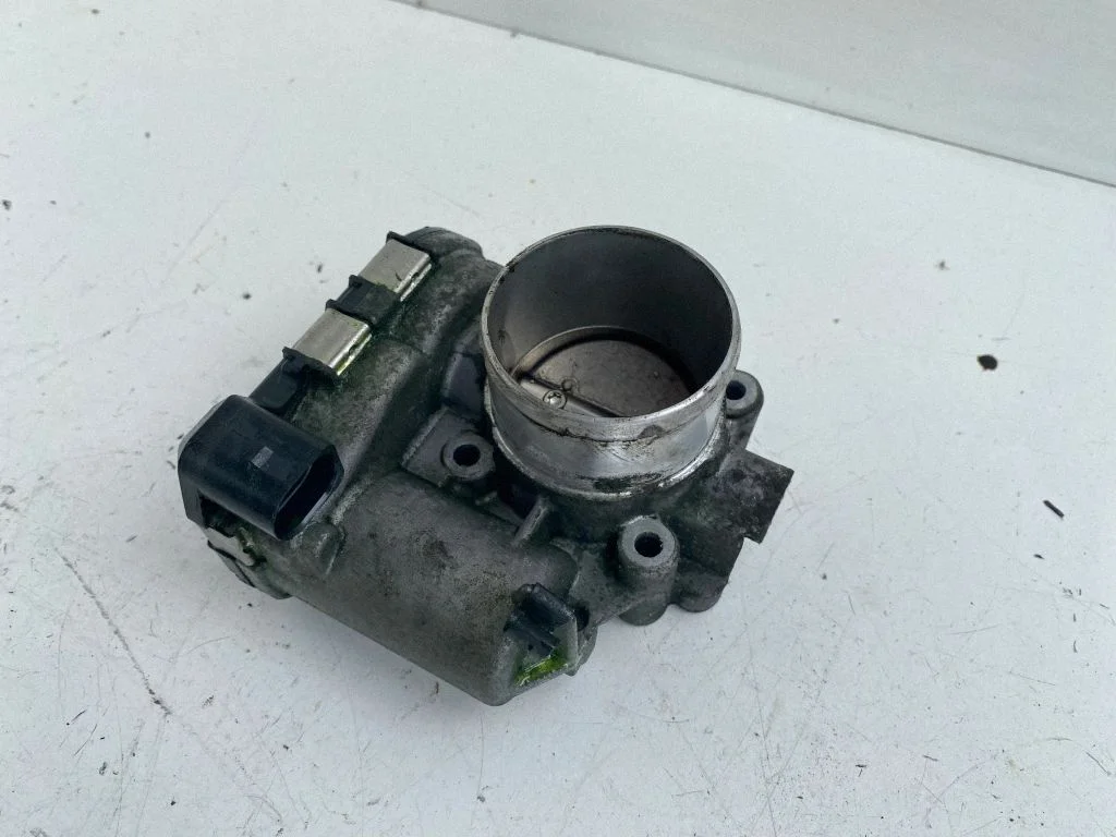 Throttle valve 7S7G9F991CA