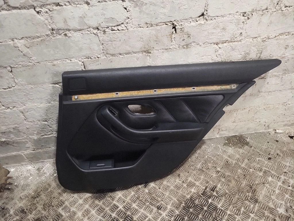 Rear door card panel trim – rear right