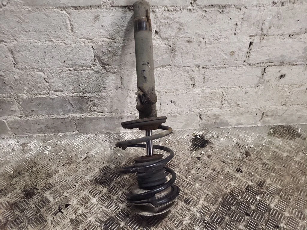 Front shock absorber with coil spring – front right