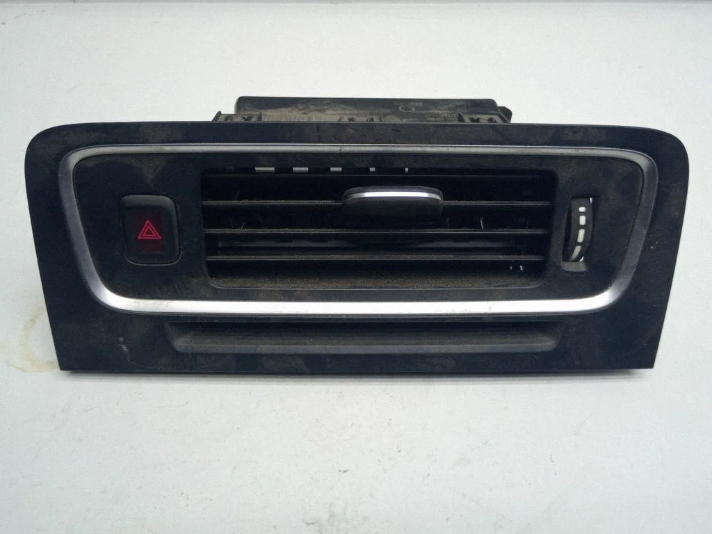 Dash center air vent grill 1302138