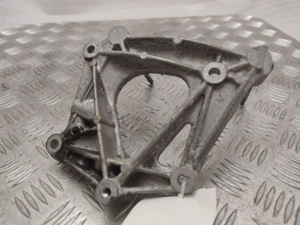 A/C compressor mount bracket 05281379AA