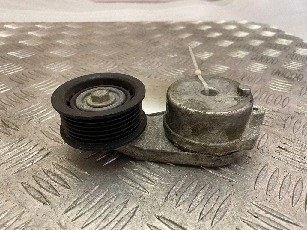 Generator/alternator belt tensioner 04627533AC