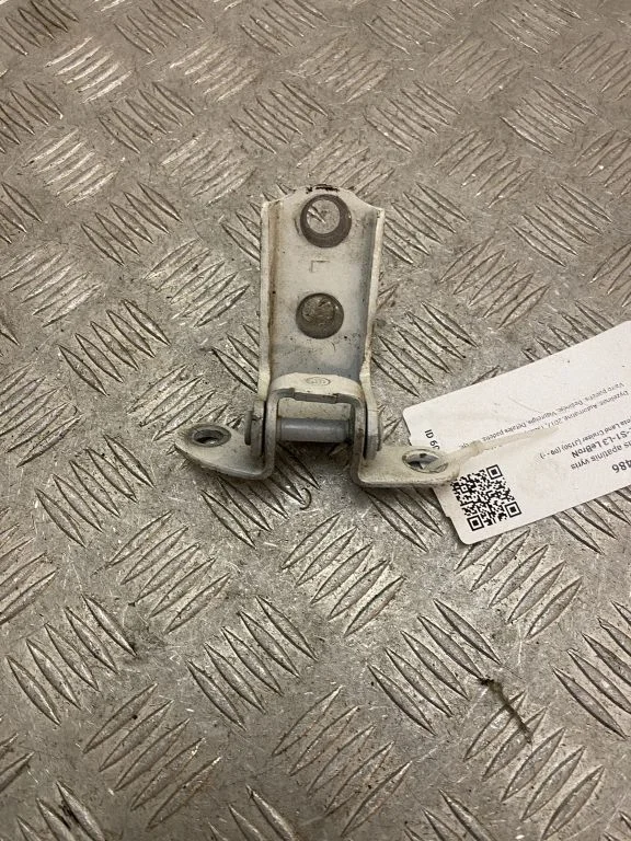 Rear door lower hinge – left