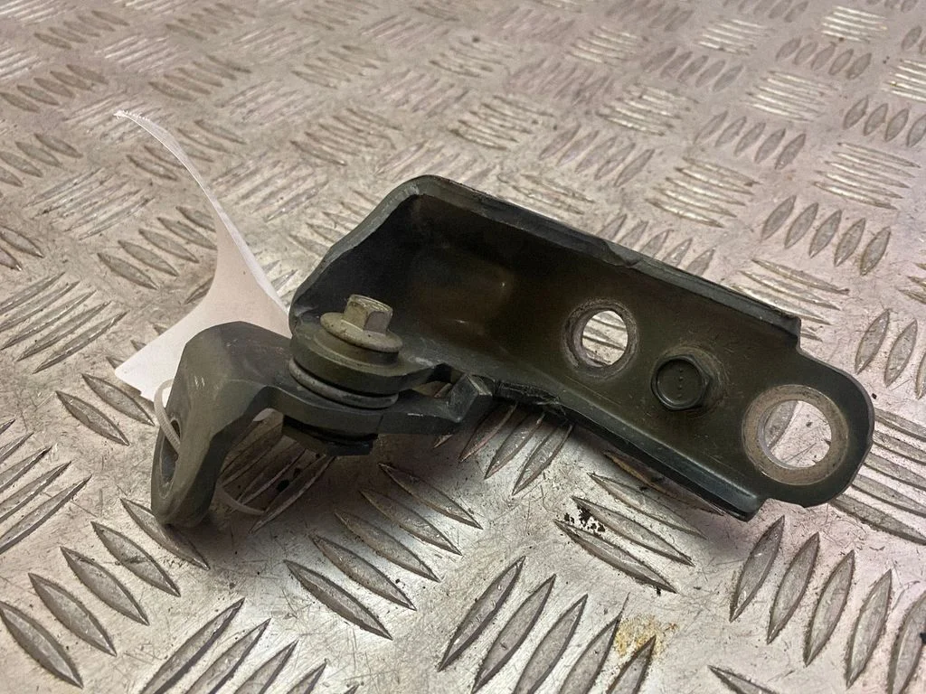 Front door upper hinge – left