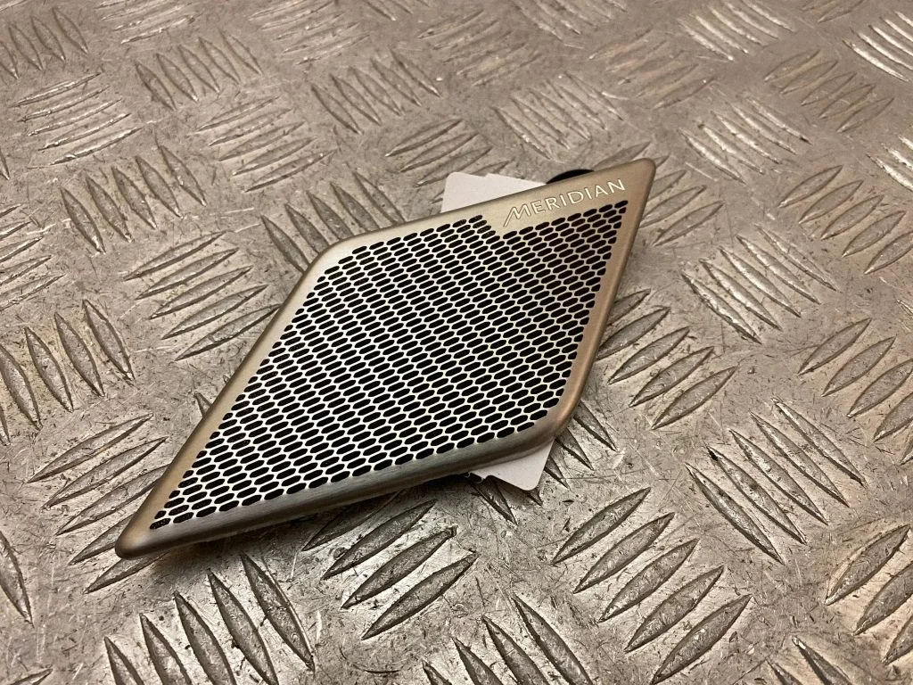 Rear door speaker cover trim