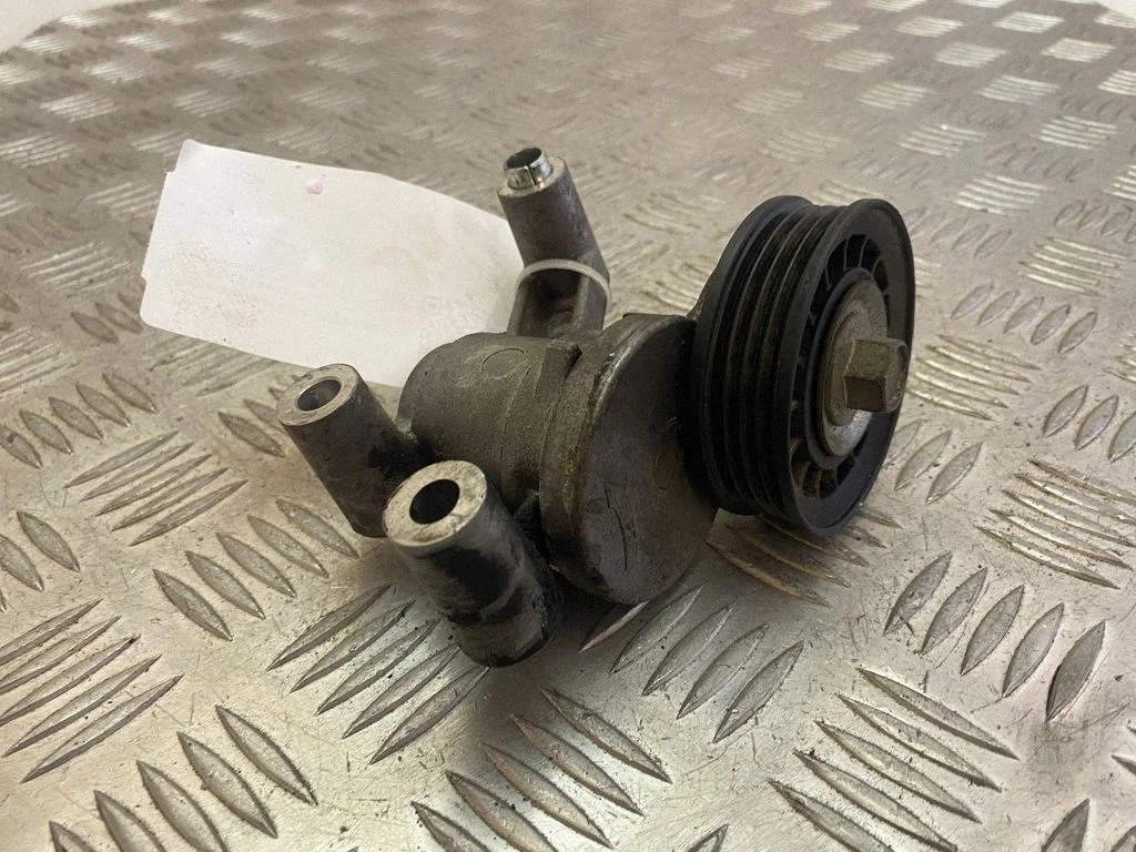 Alternator belt tensioner CV6E6A228AB