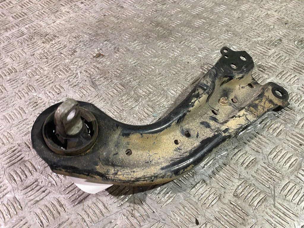 Rear suspension control arm – left