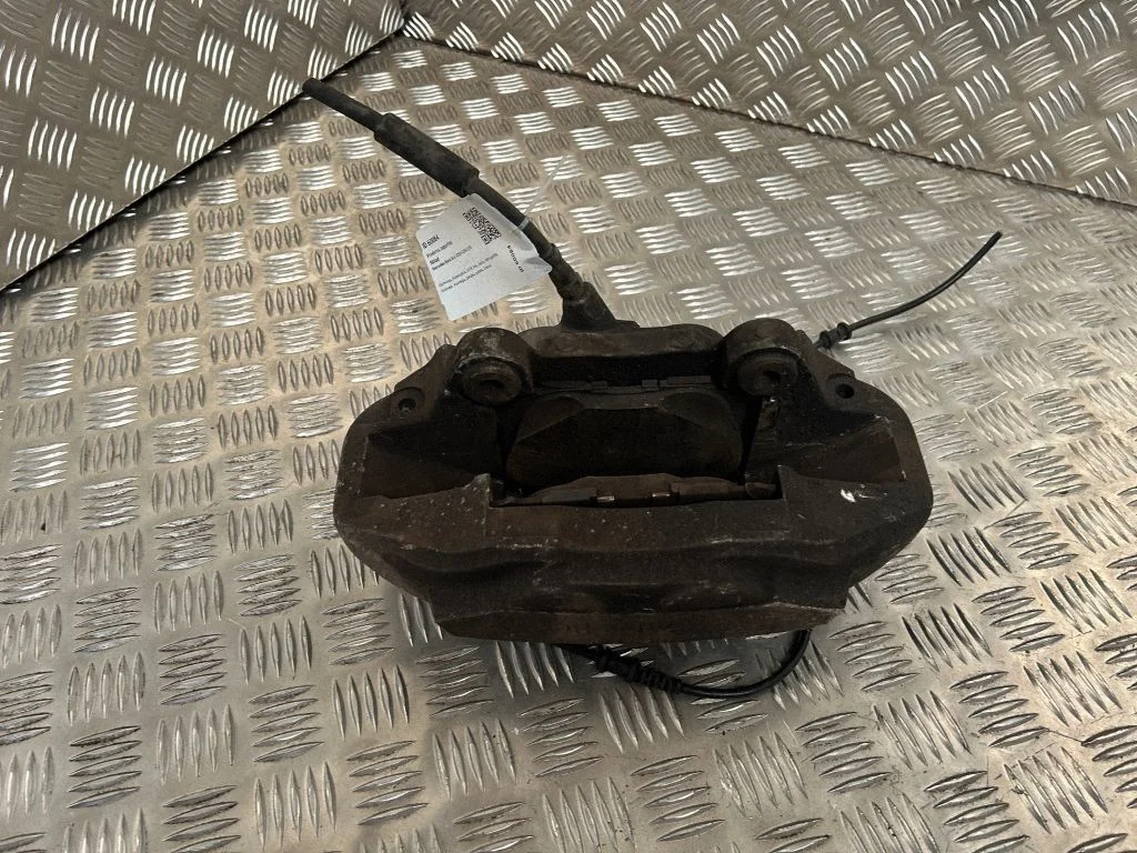 Front brake caliper 25308