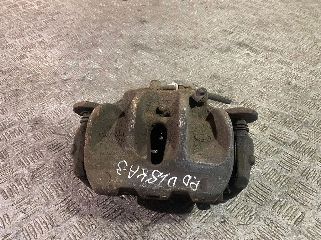 Front brake caliper – right