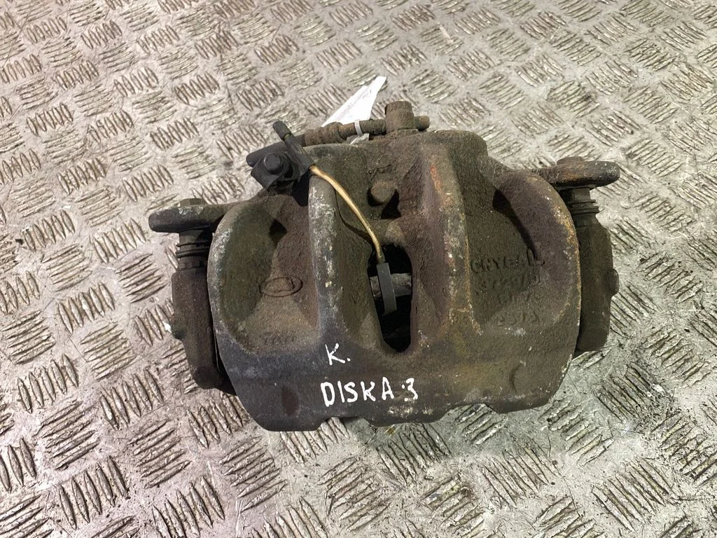 Front brake caliper – left