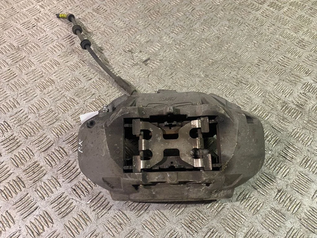 Front brake caliper – left
