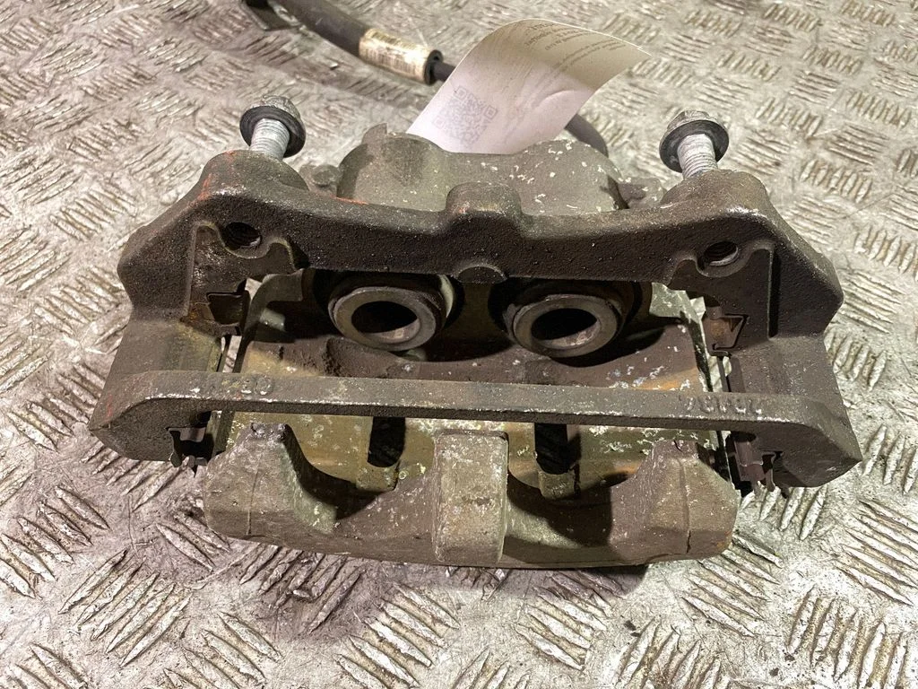 Front brake caliper – left