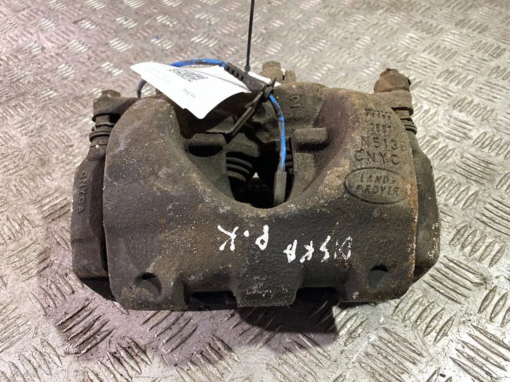 Front brake caliper – left