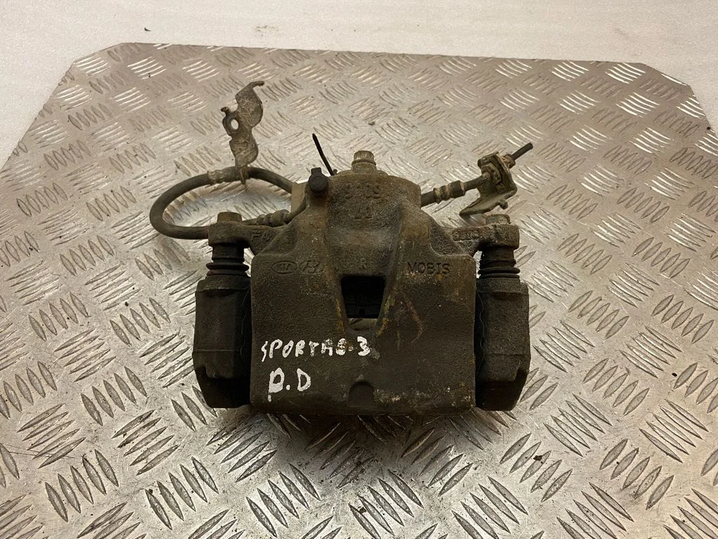 Front brake caliper – right