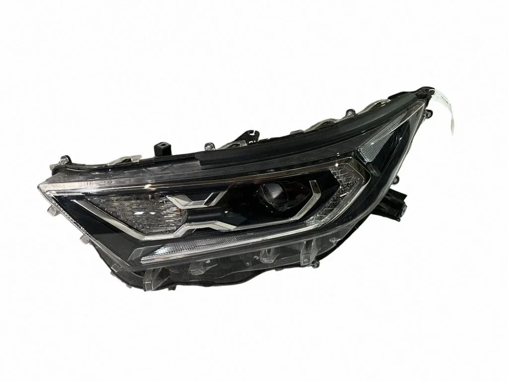 Headlight/headlamp – left