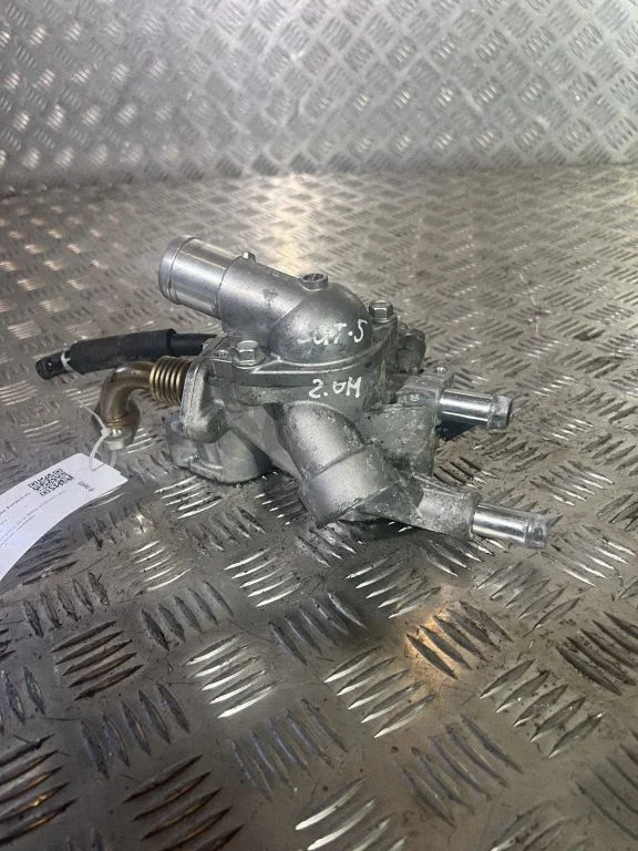 Thermostat/thermostat housing