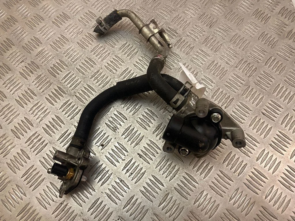 Thermostat/thermostat housing