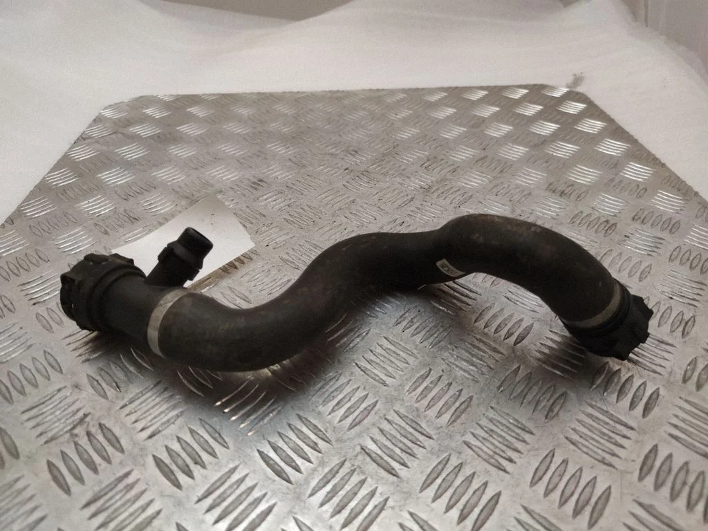 Engine coolant pipe/hose 8667356