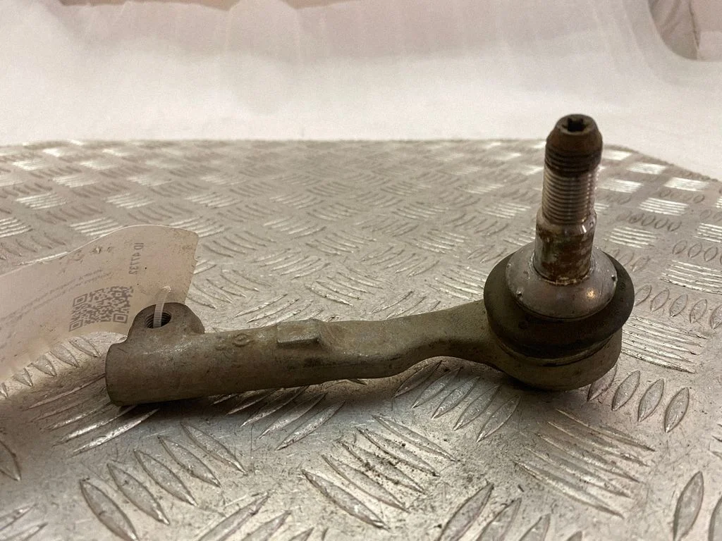 Steering tie rod end – left