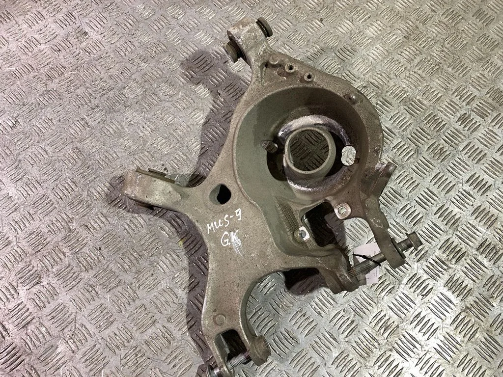 Rear upper control arm/wishbone – left