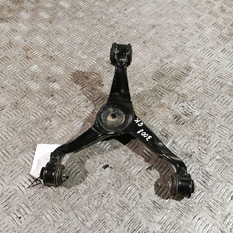 Rear upper control arm/wishbone – left