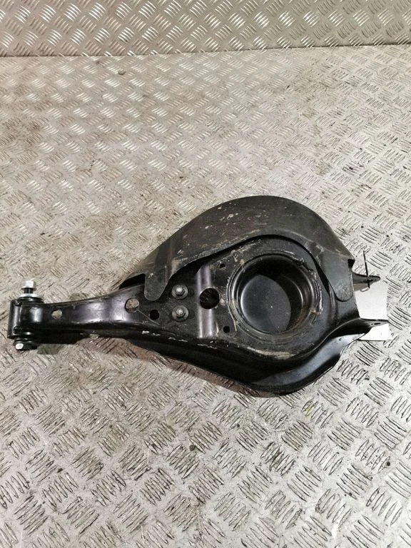 Rear upper control arm/wishbone – left