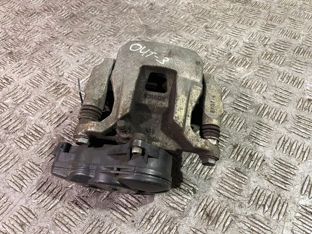 Rear brake caliper – right